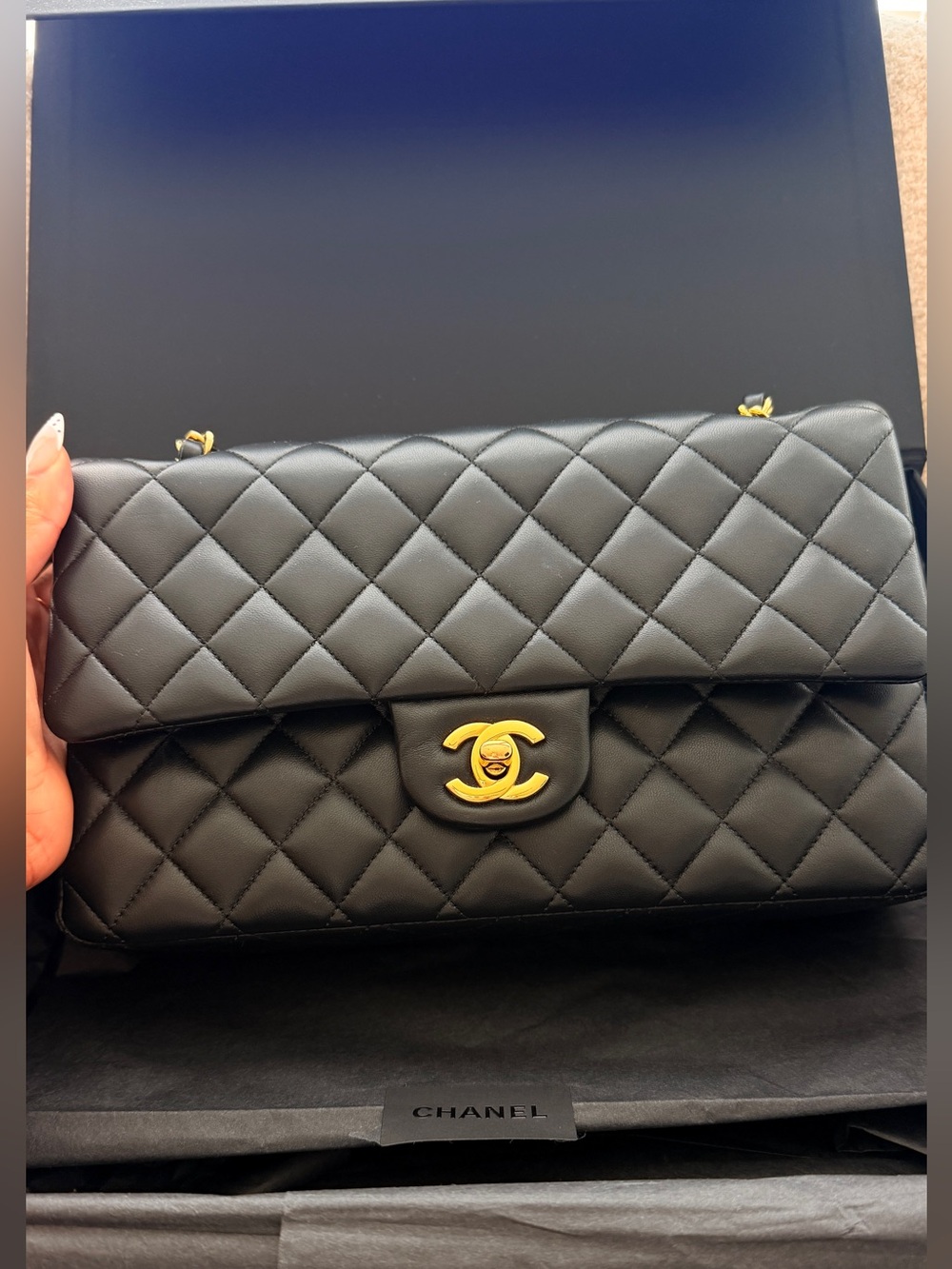 CHANEL Classic 11.12 handbag, Lambskin & gold tone metal, black